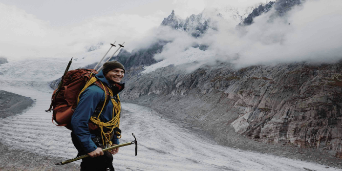 A hiker using a trekking pole